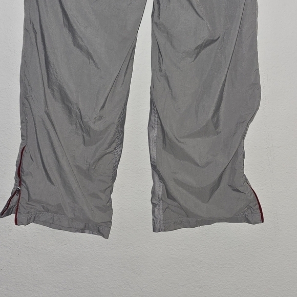 Nike Wind Breaker Pants Women Sz 4-6 Gray Hem Side Zippers Athleisure - Picture 8 of 15